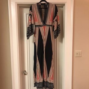 Lulu’s maxi dress with cutout back and sleeves